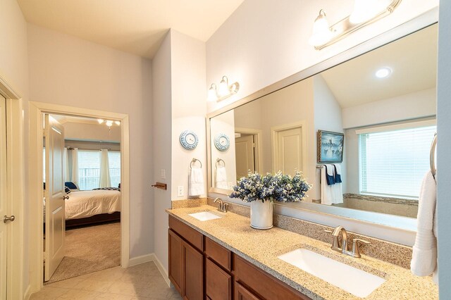 bathroom with vanity and tile patterned floors