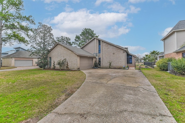 exterior space featuring a garage and a front lawn