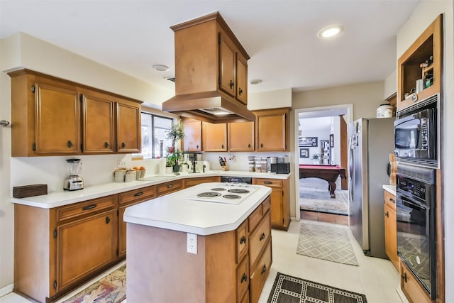 kitchen featuring black oven, stainless steel fridge, a kitchen island, built in microwave, and white electric stovetop