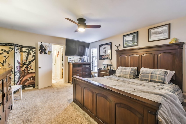 bedroom with light colored carpet and ceiling fan