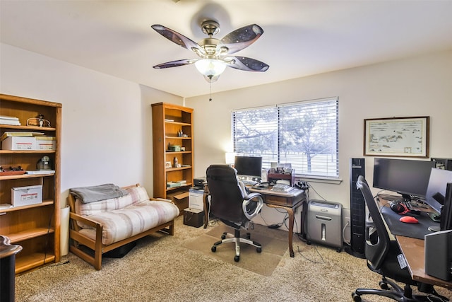 carpeted office with ceiling fan