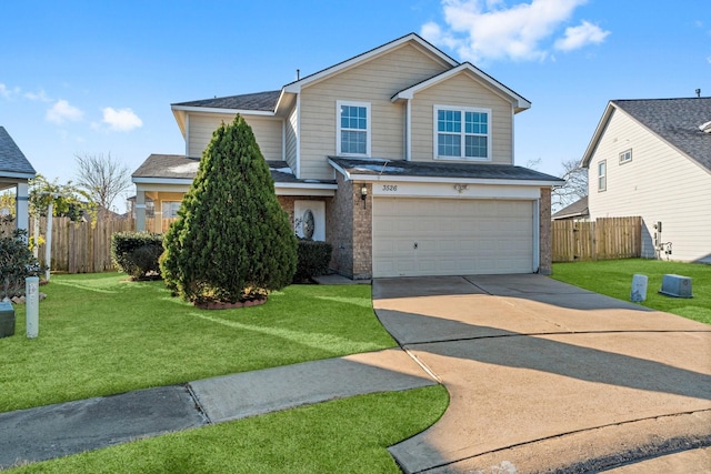 view of front of property with a garage and a front yard