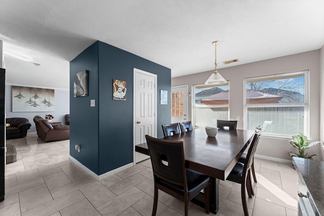 view of tiled dining space