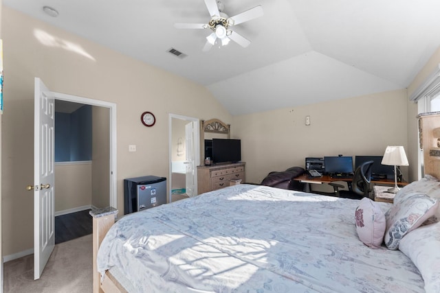 carpeted bedroom featuring lofted ceiling and ceiling fan