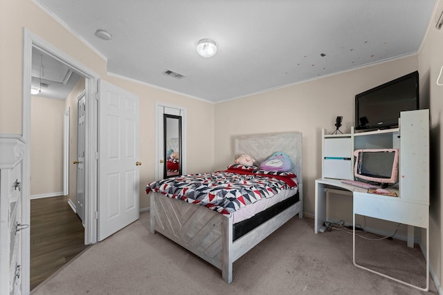 carpeted bedroom with crown molding