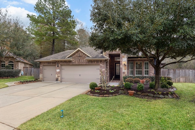 view of front facade with a garage and a front yard