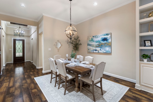 dining area with crown molding, dark hardwood / wood-style floors, a chandelier, and built in shelves