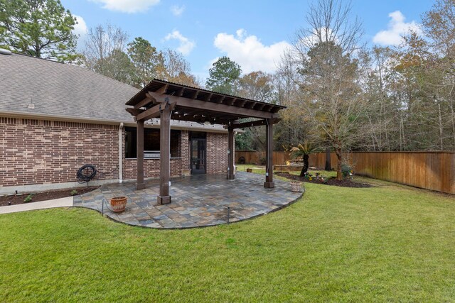 view of yard featuring a pergola and a patio