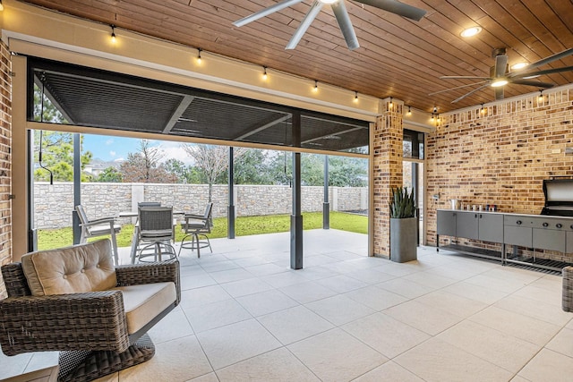 view of patio / terrace with ceiling fan