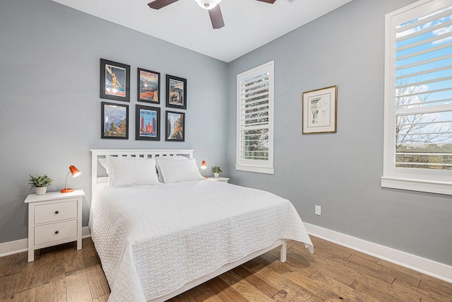 bedroom featuring ceiling fan and wood-type flooring