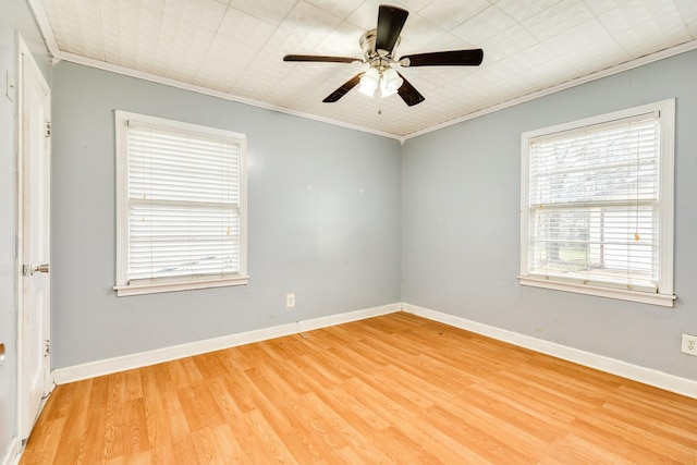 unfurnished room with ceiling fan, ornamental molding, and hardwood / wood-style floors