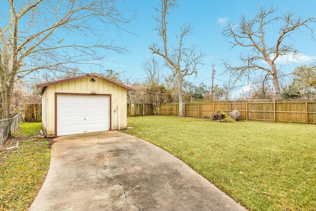 view of yard with an outbuilding and a garage