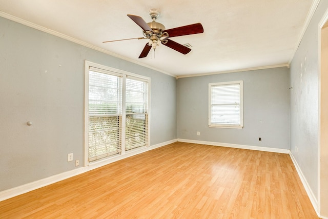 unfurnished room featuring crown molding, ceiling fan, and light hardwood / wood-style floors