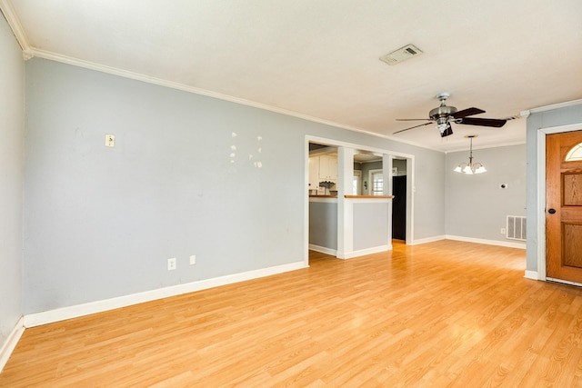 unfurnished living room featuring ceiling fan with notable chandelier, ornamental molding, and light hardwood / wood-style floors