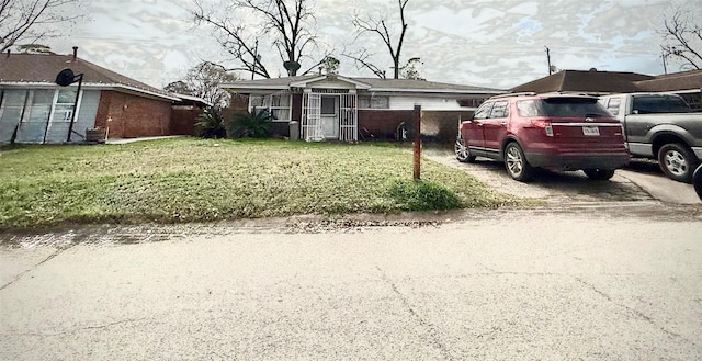 exterior space featuring a front lawn