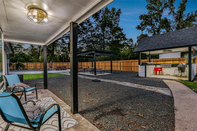 view of yard with a gazebo, area for grilling, and a patio