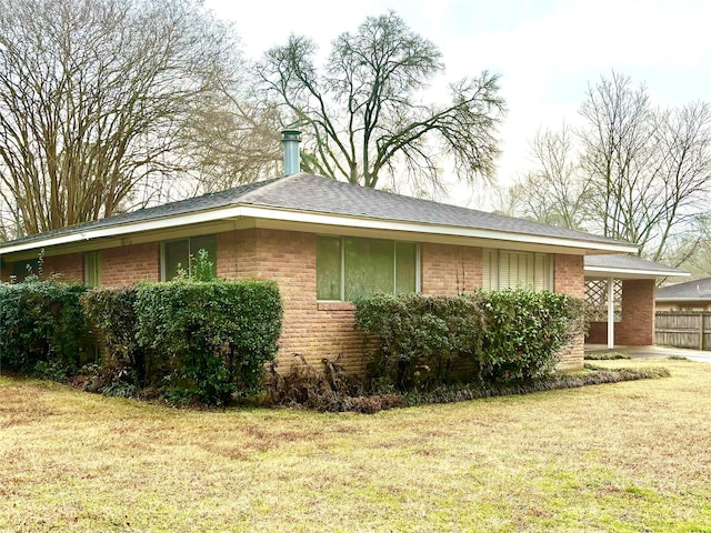 view of home's exterior featuring a lawn