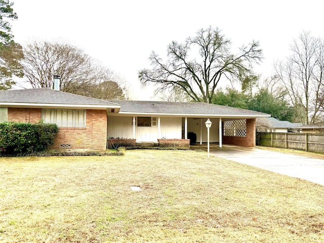 ranch-style house with a carport and a front yard