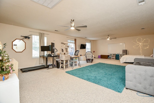 view of pool featuring ceiling fan