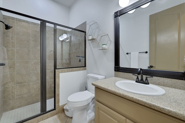 17715 Lakeside Haven Dr, Cypress, TX 77433 - bathroom with a stall shower, toilet, vanity, and tile patterned floors