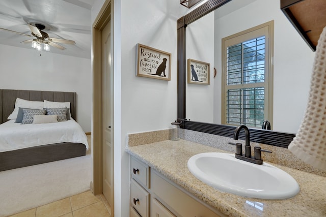 17715 Lakeside Haven Dr, Cypress, TX 77433 - bathroom featuring a ceiling fan, tile patterned flooring, and vanity