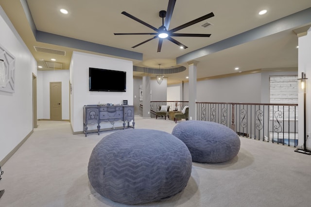 17715 Lakeside Haven Dr, Cypress, TX 77433 - living area with light carpet, a ceiling fan, attic access, recessed lighting, and decorative columns