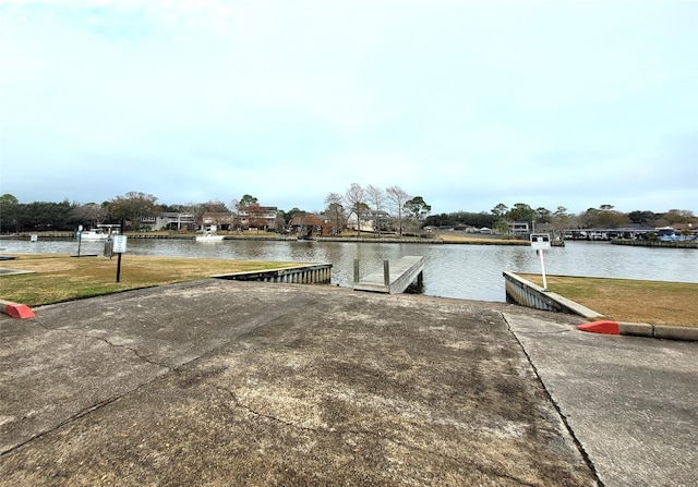 dock area with a water view