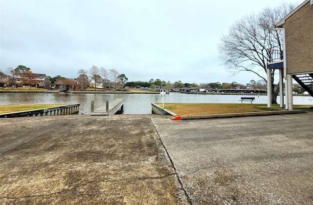 dock area featuring a water view