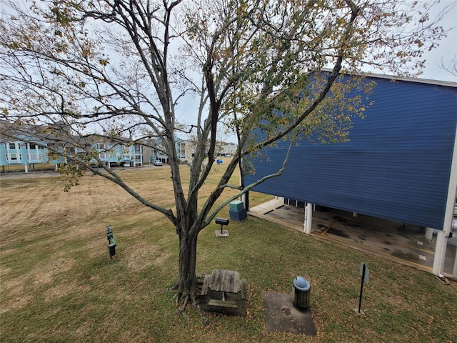 view of yard featuring central AC