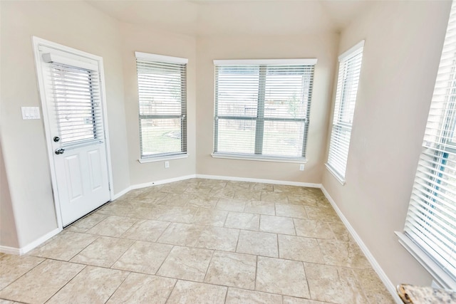 empty room featuring light tile patterned flooring