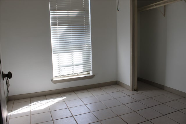 unfurnished bedroom featuring light tile patterned floors