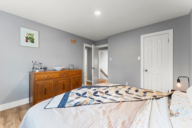 bedroom featuring light wood-type flooring