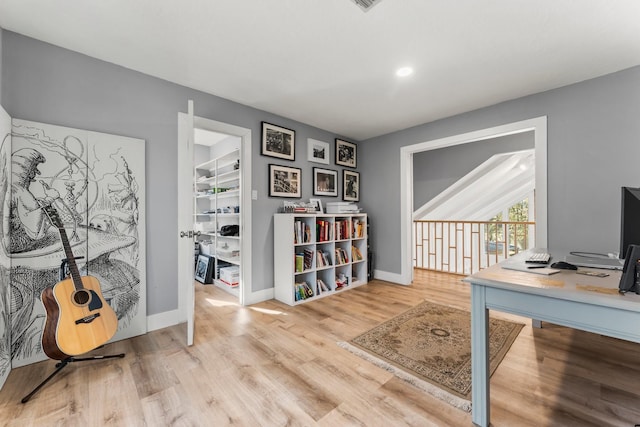 office area with light wood-type flooring