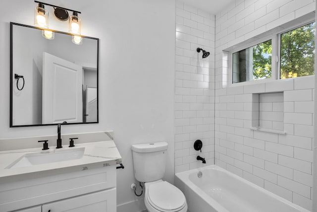 bathroom with vanity, toilet, and shower / bathtub combination