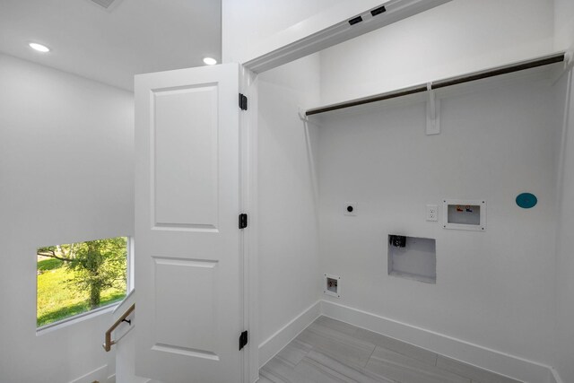 washroom with baseboards, washer hookup, laundry area, recessed lighting, and electric dryer hookup