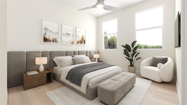 bedroom featuring ceiling fan and light hardwood / wood-style flooring