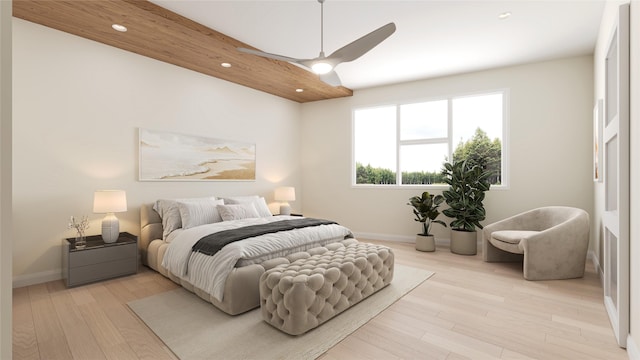 bedroom with ceiling fan and light hardwood / wood-style floors