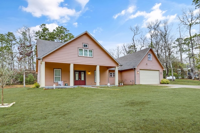 view of front of house featuring french doors, a garage, covered porch, and a front lawn