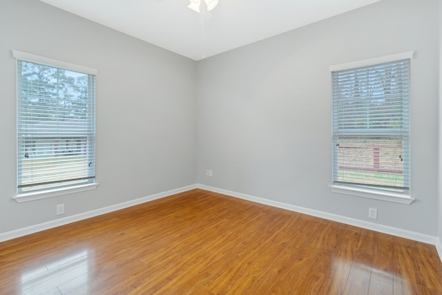 unfurnished room featuring wood-type flooring