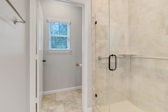 bathroom with an enclosed shower