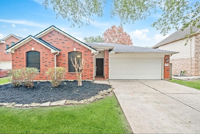 single story home featuring a garage and a front yard