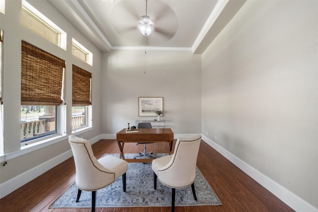 office space featuring crown molding, ceiling fan, and wood-type flooring