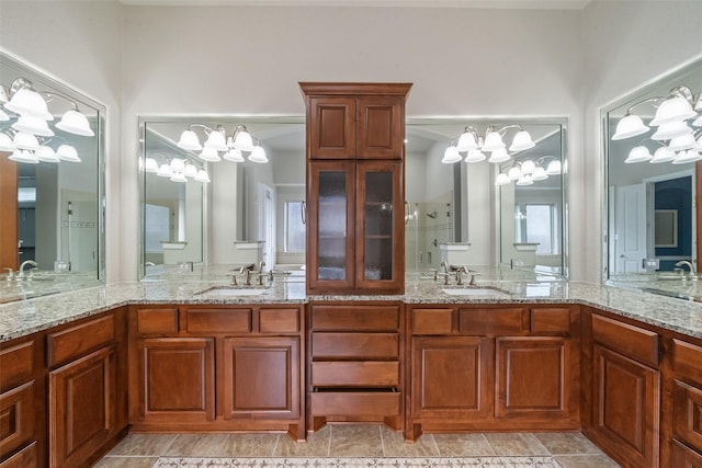 full bathroom featuring a sink and double vanity