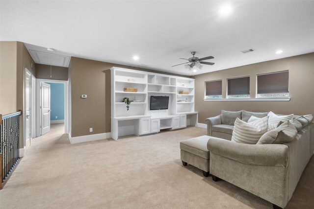 living room featuring light colored carpet and ceiling fan