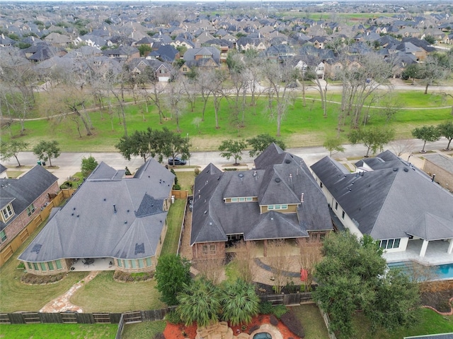 birds eye view of property with a residential view