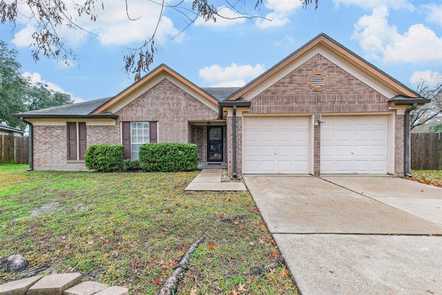 ranch-style house with a garage and a front lawn