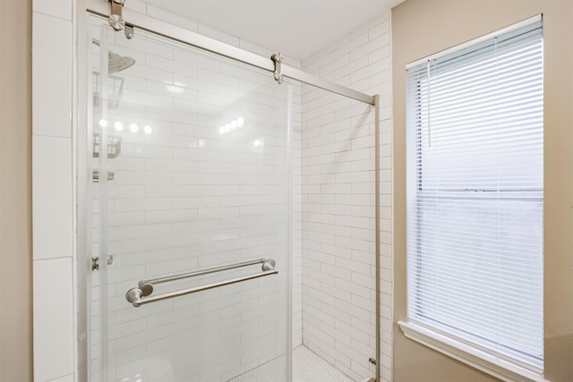 bathroom featuring walk in shower