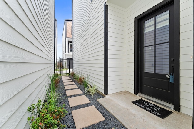 property entrance featuring fence