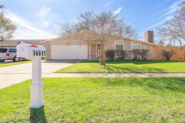 single story home featuring a garage and a front yard