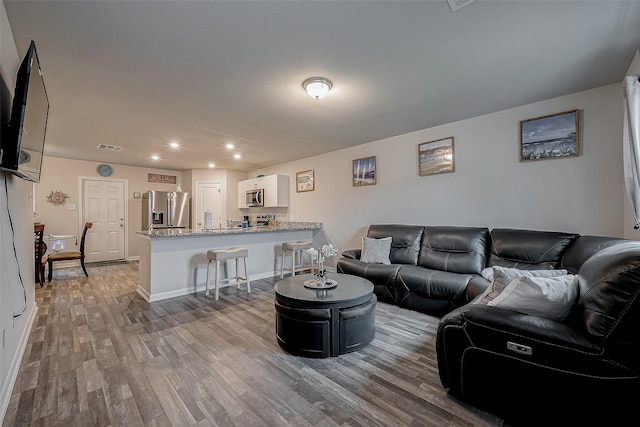 living room featuring light hardwood / wood-style floors